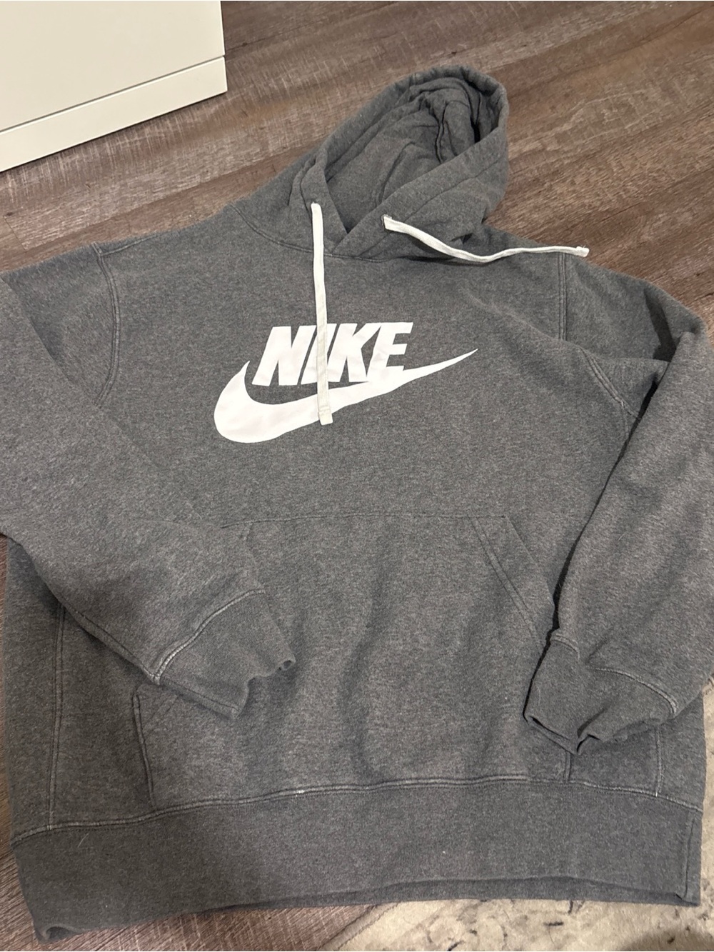 Nike Gray Pullover Hoodie with White Swoosh Logo